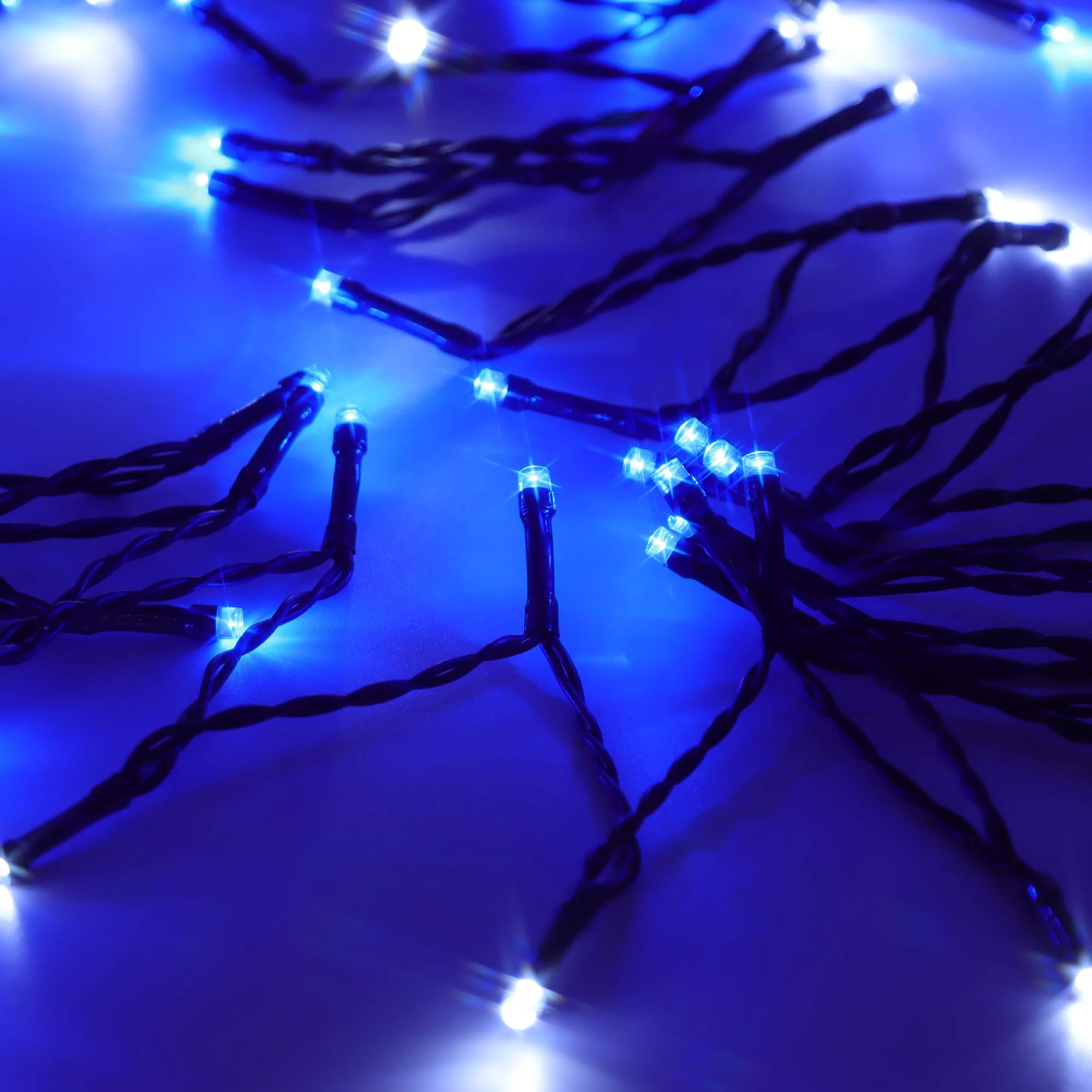 Christmas Sparkle Indoor and Outdoor Chaser Lights x 200 Blue and White LEDs - Mains Operated - Image 3